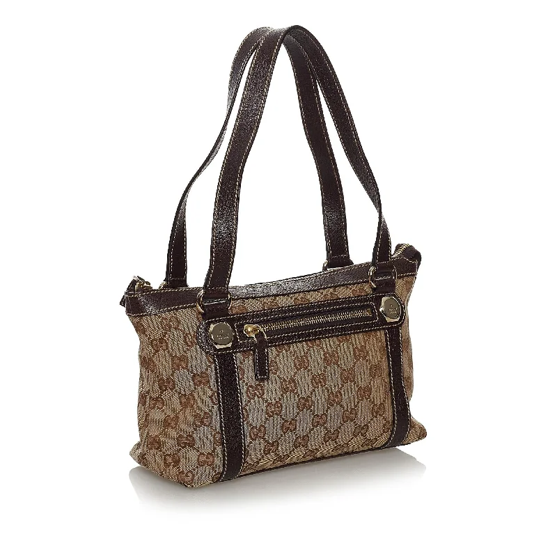 Women Gucci bags with a snap - button closure and a decorative charmGucci GG Canvas Charmy Shoulder Bag (33251)