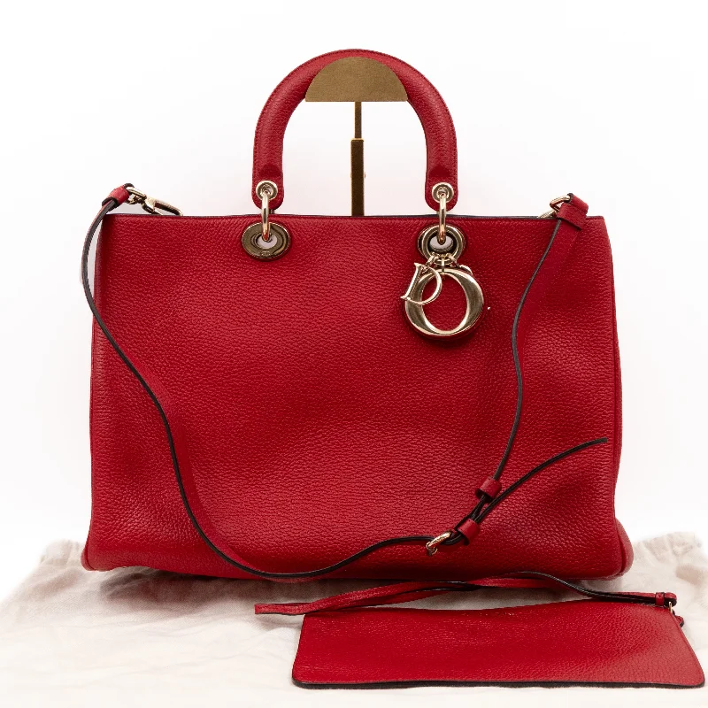 Christian Dior handbags with a snap - button closure and a decorative buckleDiorissimo Medium Red Leather