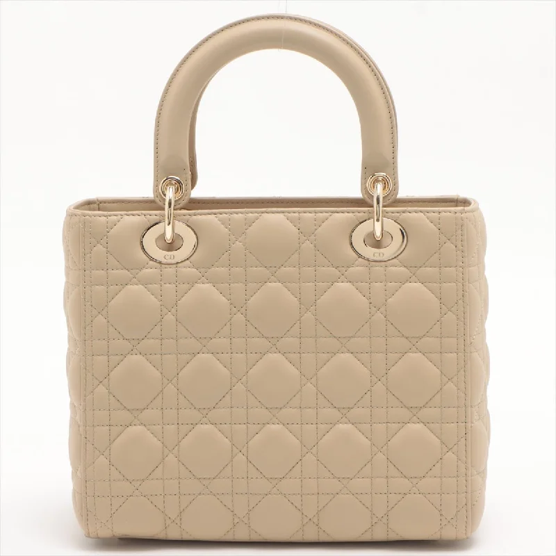 Christian Dior Saddle bags with a patent leather finish for a shiny lookLady Dior Medium Cannage Leather Beige Bag