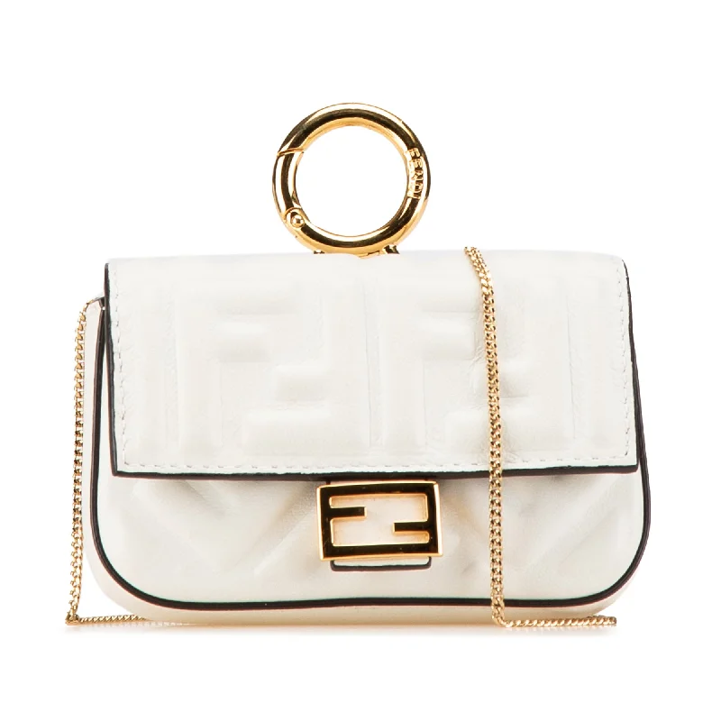 Fendi By The Way bags with a 3D - printed FF logo for a modern and textured lookWhite Fendi Nano Zucca Embossed Baguette Charm Crossbody Bag