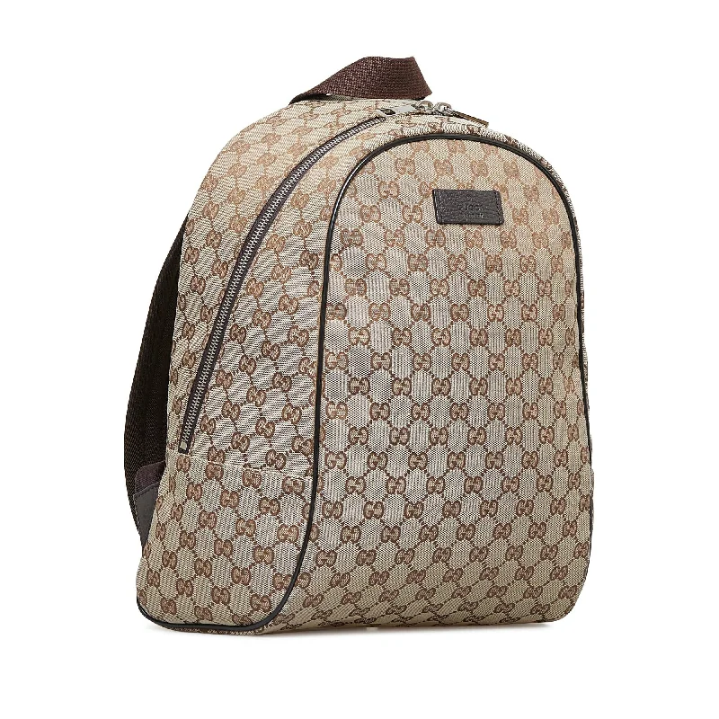 Women Gucci bags with a snap - button closure and a decorative charmGucci GG Canvas Backpack (85xo9c)