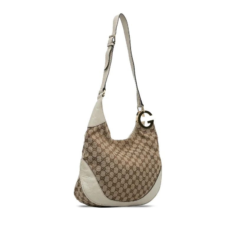 Women Gucci bags with a chain - link trim and a leather bodyGucci GG Canvas Charlotte Crossbody (KFrw1S)