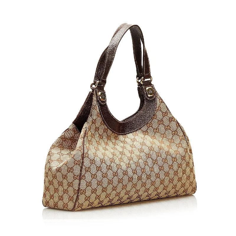 Women Gucci bags with a zippered interior pocketGucci GG Canvas Charmy Shoulder Bag (35277)