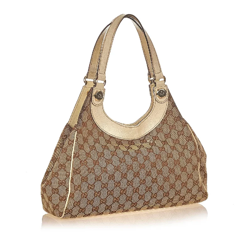 Gucci handbags for women with a beaded trimGucci GG Canvas Charmy Shoulder Bag (26010)