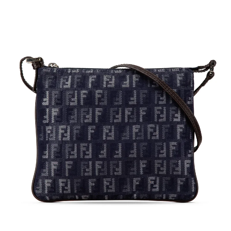 Fendi Baguette bags with a detachable charm featuring the brand's mascotBlue Fendi Zucchino Denim Crossbody