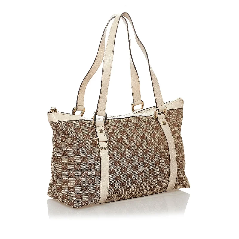 Women Gucci bags with a magnetic snap closure for easy accessGucci GG Canvas Abbey Tote Bag (32489)