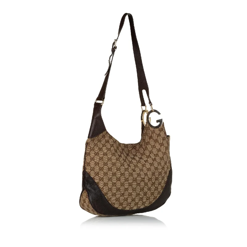 Women Gucci Sylvie bags featuring the signature web stripeGucci GG Canvas Charlotte Crossbody Bag (33186)