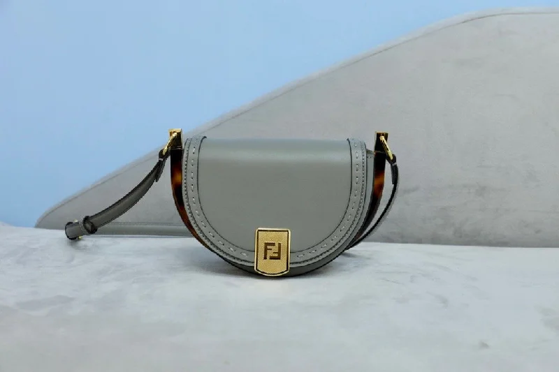 Fendi bags with a front - flap pocket and a turnlock for a classic and elegant aestheticEN   Designer bags by Fendi 056