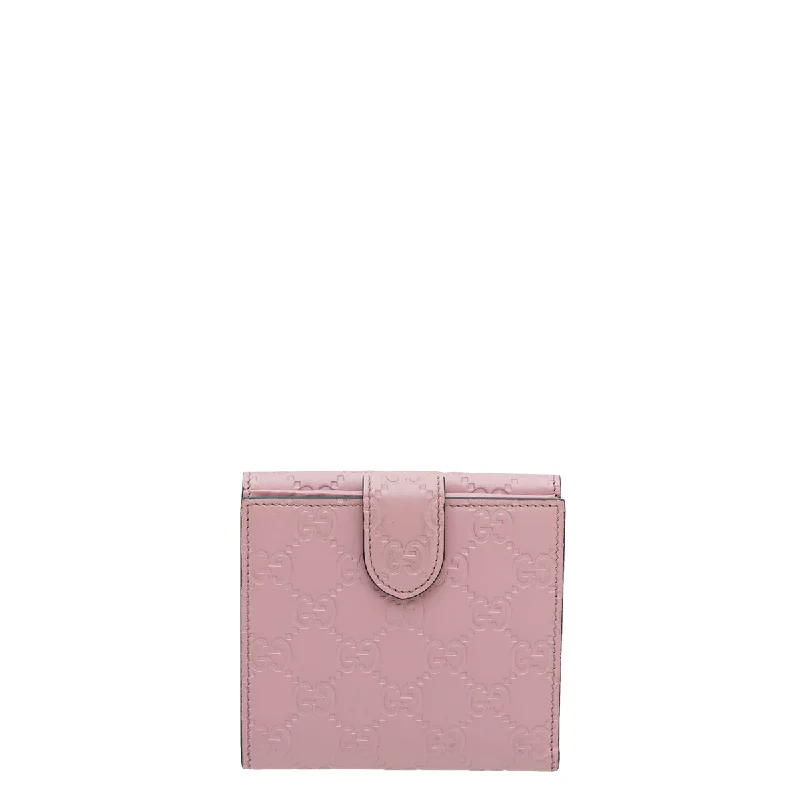 Women Gucci bags with a zippered interior pocketGucci Pink Guccissima Interlocking G French Wallet