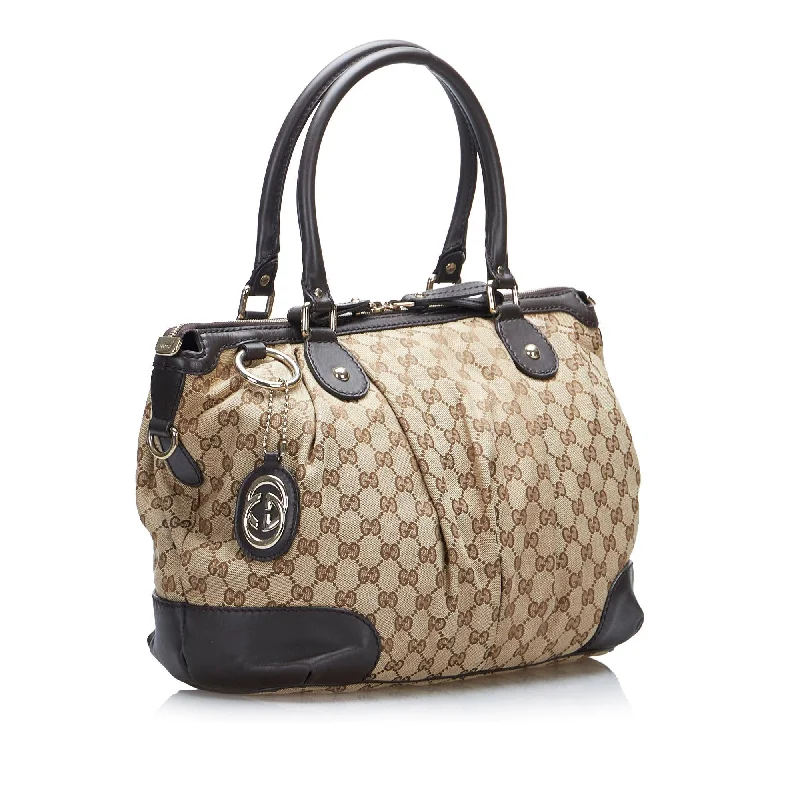 Gucci tote bags for women with a spacious interiorGucci GG Canvas Sukey Satchel (SHG-D5vFKz)