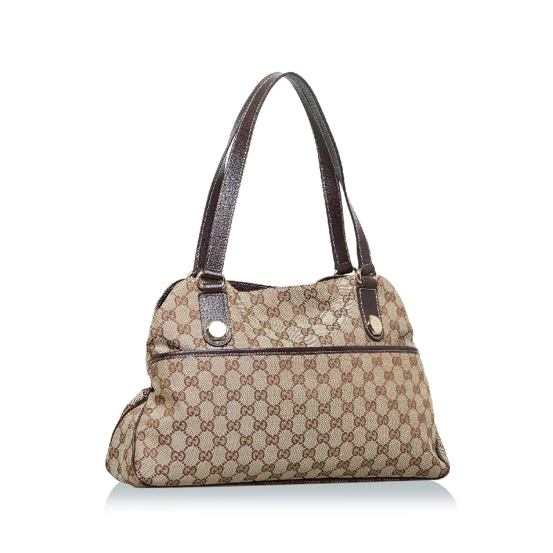 Women Gucci bags with interlocking G hardware for a classic lookGucci GG Canvas Charmy Shoulder Bag (GeAMUI)