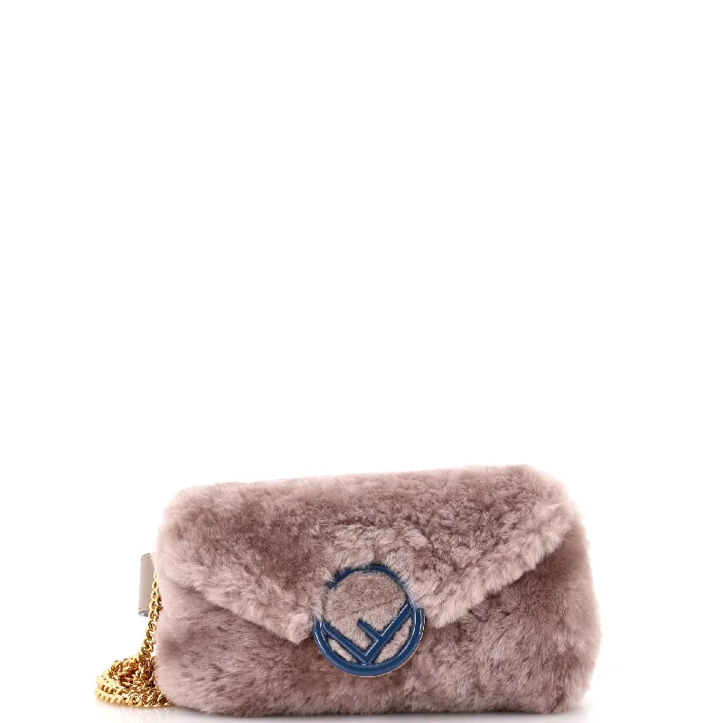 Ladies Fendi handbags with a detachable wallet insert for added convenienceF is Fendi Convertible Belt Bag Shearling