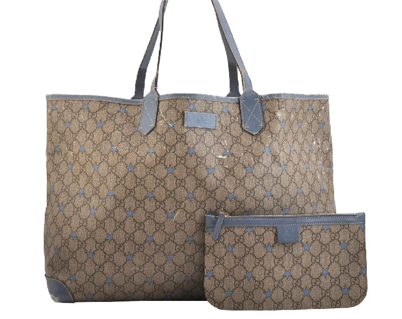 Gucci tote bags for women with a water - resistant coatingAuthentic GUCCI GG Supreme Stars Tote Bag GG PVC Leather 309497 Brown Blue 9102J