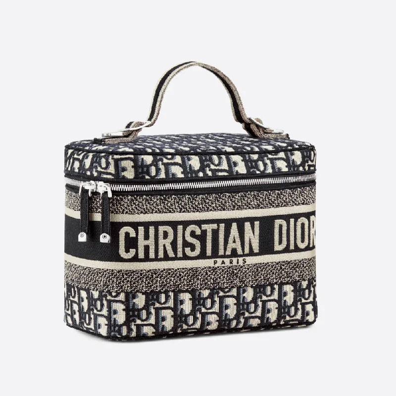 Christian Dior Saddle bags with a patent leather finish for a shiny lookDIORTRAVEL COSMETIC BAG