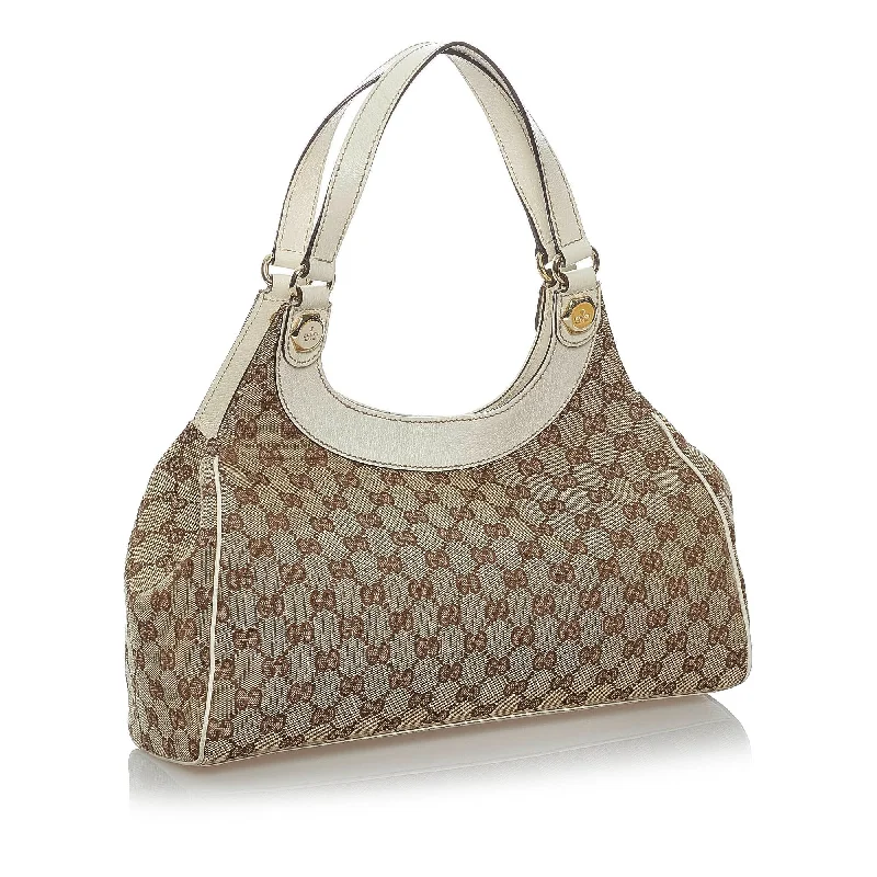 Women Gucci Sylvie bags featuring the signature web stripeGucci GG Canvas Charmy Shoulder Bag (30421)