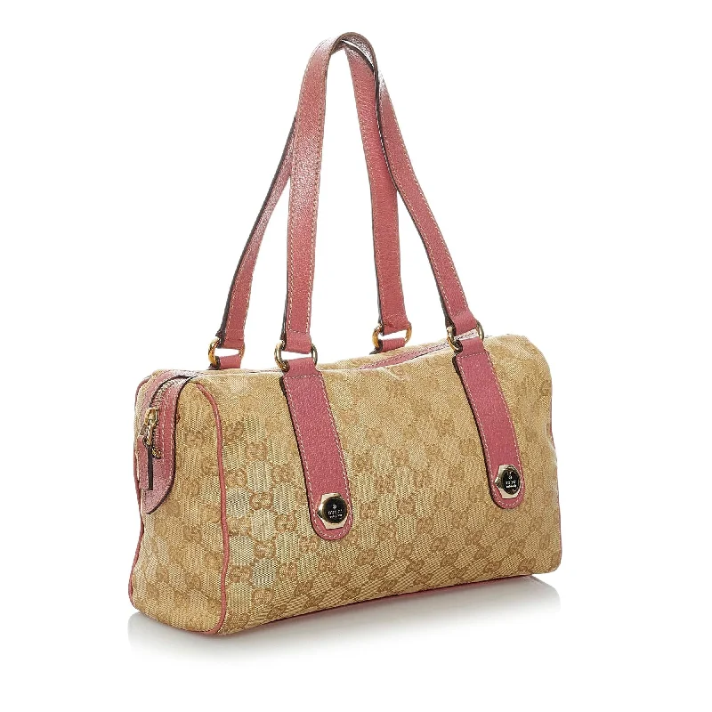 Women Gucci bags with interlocking G hardware for a classic lookGucci GG Canvas Charmy Shoulder Bag (29552)