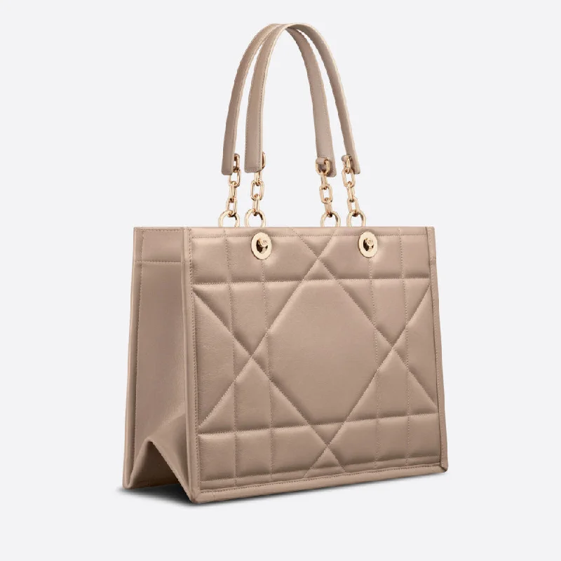 Contemporary Christian Dior handbags with a unique shapeMEDIUM DIOR ESSENTIAL TOTE BAG