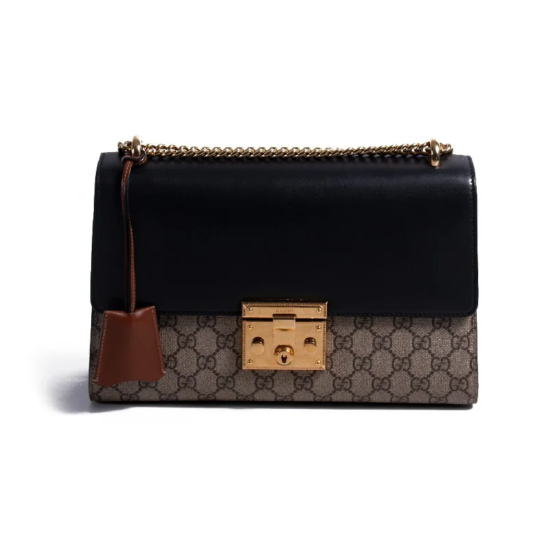 Gucci handbags for women with a back - zip pocketGucci Supreme Medium Padlock Shoulder Bag