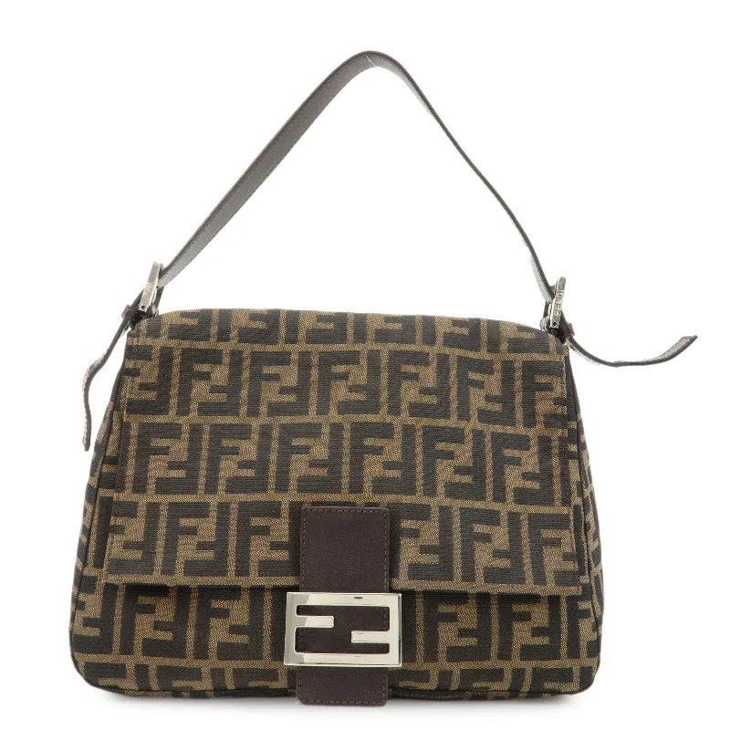 Fendi Sunshine Shopper bags with a contrast - stitched handle for a unique and stylish lookFENDI Mamma Baguette Zucca Canvas Leather Shoulder Bag 26325