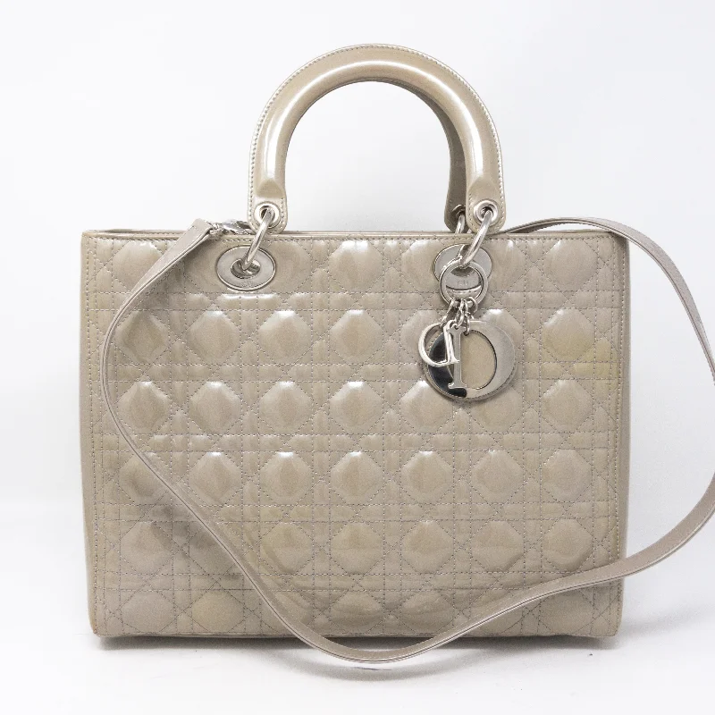 Christian Dior Saddle bags with a studded trim for a bold lookLady Dior Large Pearl Grey Patent Leather