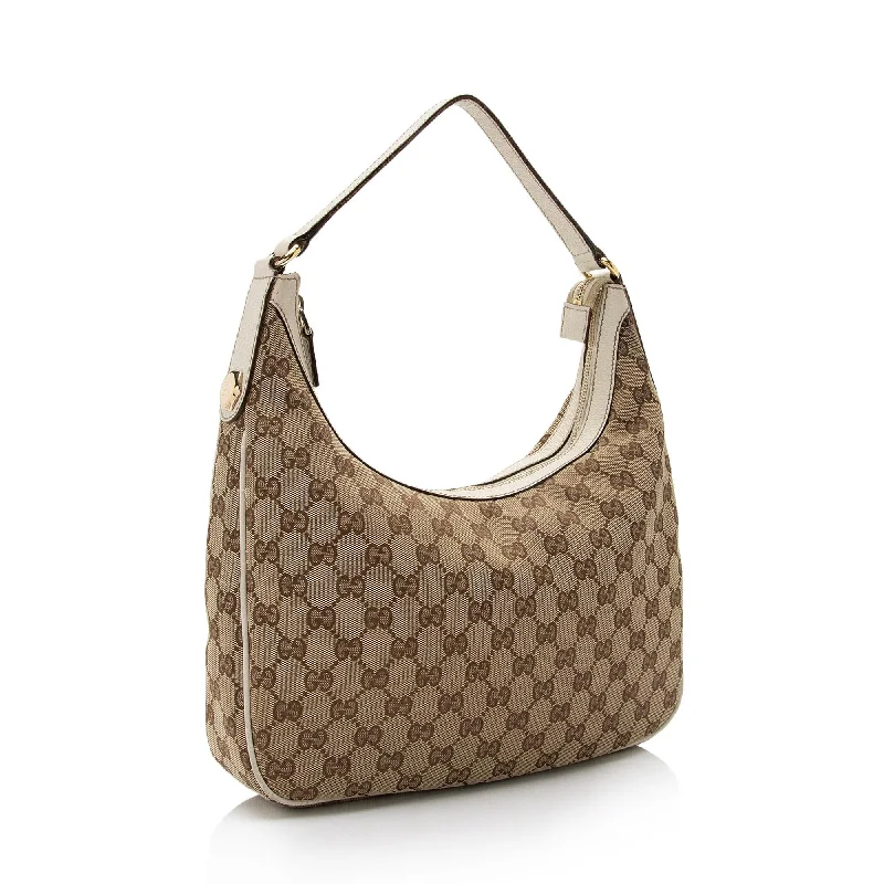 Ladies Gucci Dionysus bags in a pastel colorGucci GG Canvas Charmy Hobo (SHF-Xs0SFM)