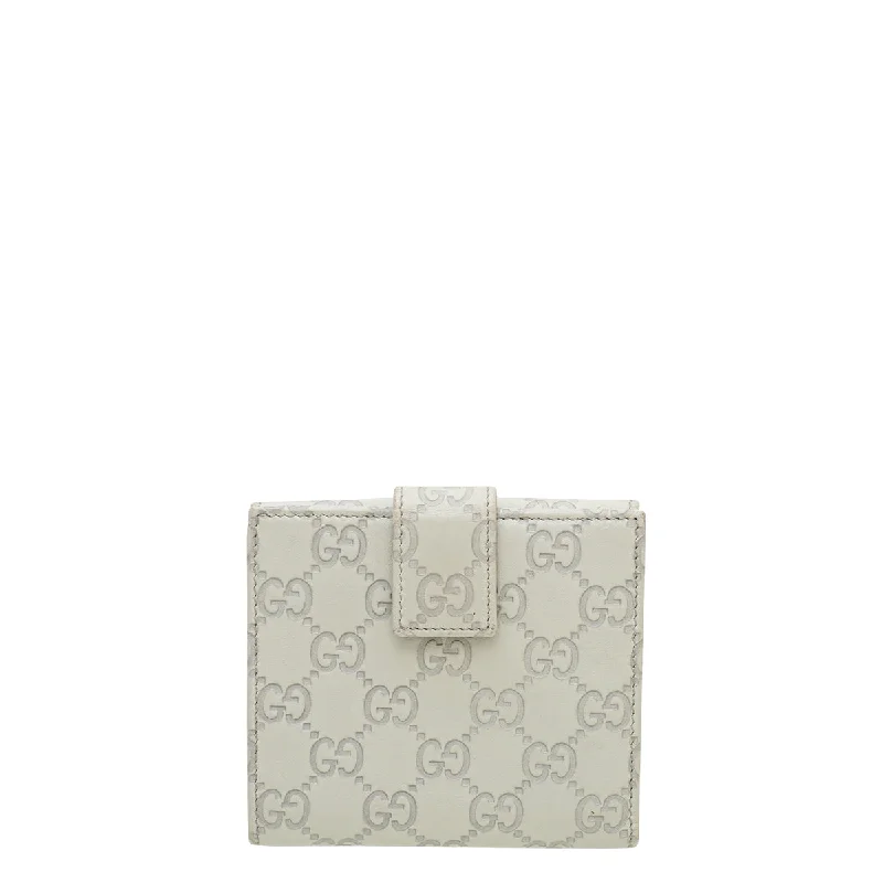 Women Gucci tote bags in GG Supreme canvas for a branded feelGucci Cream Interlocking G Guccissima French Wallet