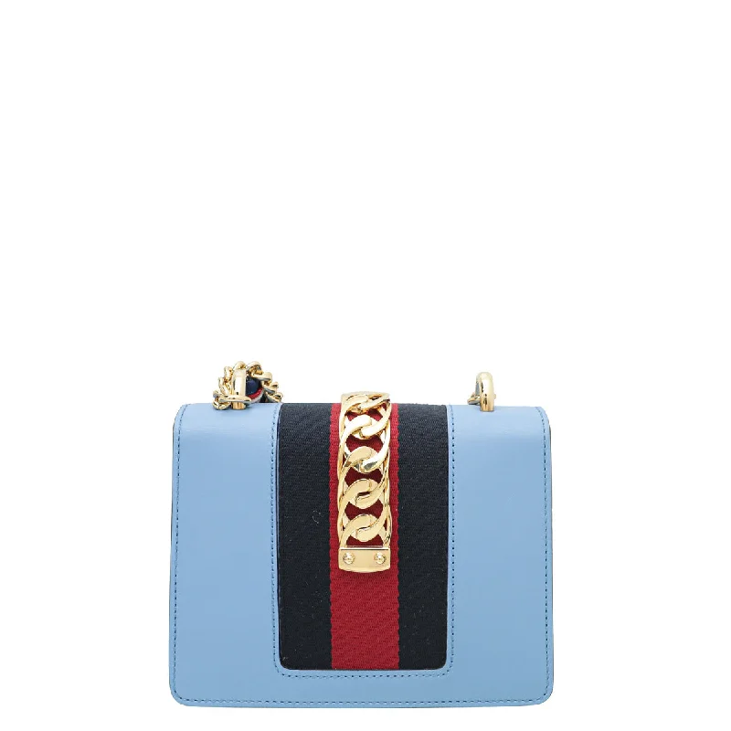 Women Gucci bags with a front - flap pocket for quick - access itemsGucci Blue Sylvie Mini Chain Flap Bag