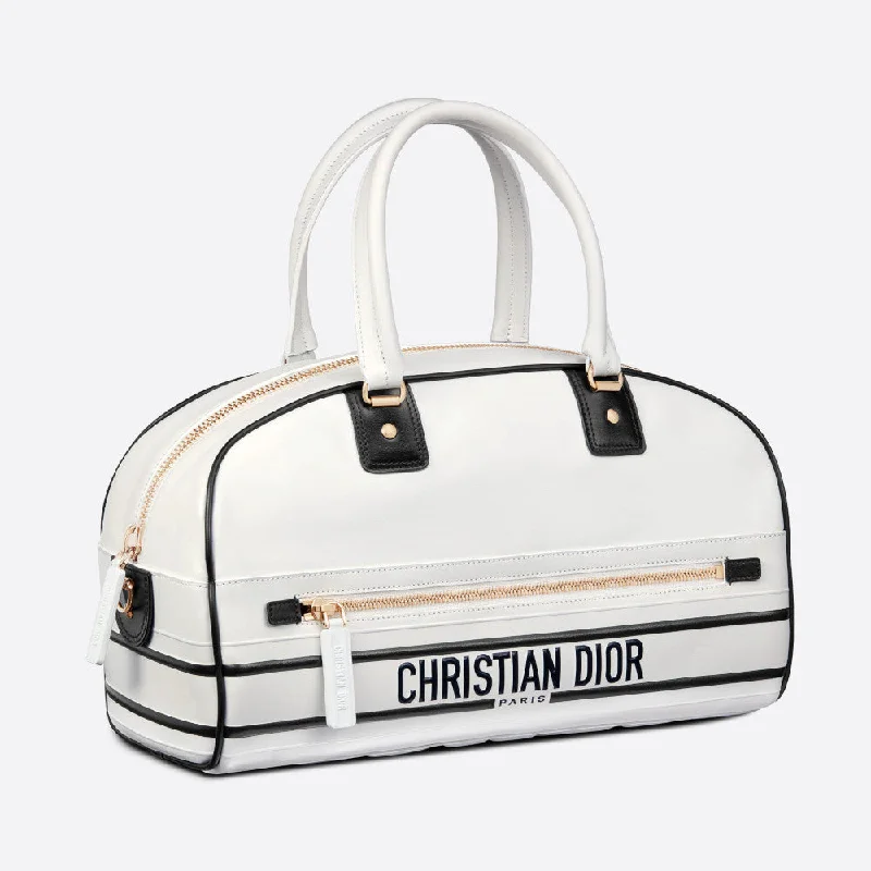 Christian Dior Saddle bags with a distressed leather finishMEDIUM DIOR VIBE ZIP BOWLING BAG