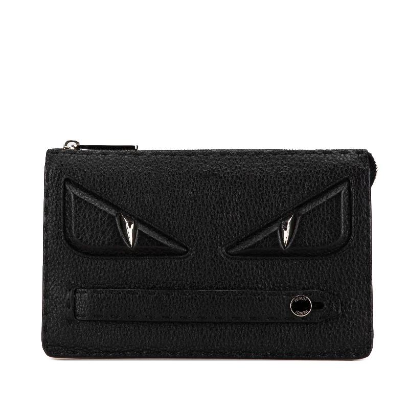 Fendi bags with a zip - top closure and a front - pocket for quick access to keys and cardsBlack Fendi Leather Selleria Monster Clutch