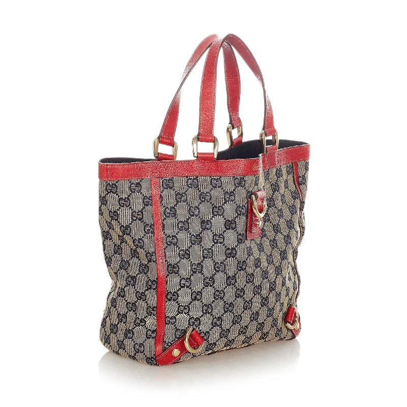 Ladies Gucci handbags with a detachable coin purse insideGucci GG Canvas Abbey Tote Bag (31902)