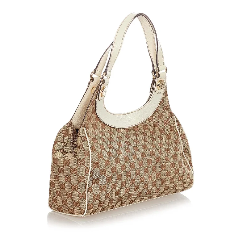 Gucci backpacks for women with a hidden back pocketGucci GG Canvas Charmy Shoulder Bag (23072)