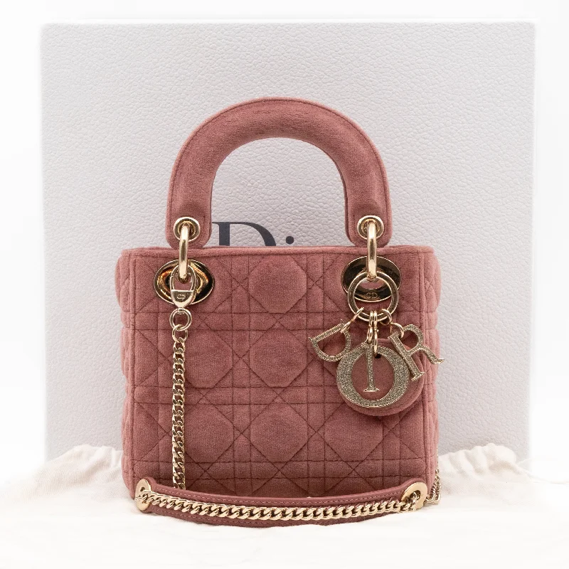 Christian Dior backpacks with a sleek, minimalist silhouetteLady Dior Mini Blush Pink Velvet