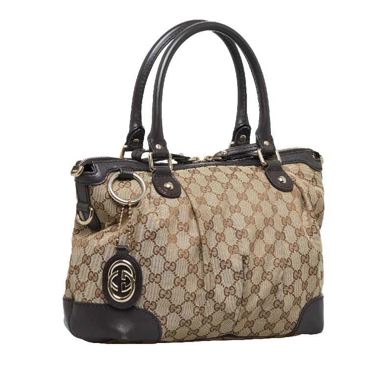 Ladies Gucci shoulder bags with a tassel decorationGucci GG Canvas Sukey Satchel (SHG-O2Zpoa)