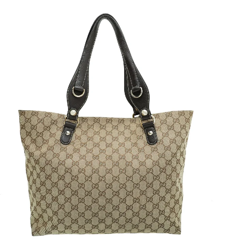 Gucci Marmont bags for women with gold - toned hardwareGucci Bicolor GG Icon Bit Tote Medium Bag