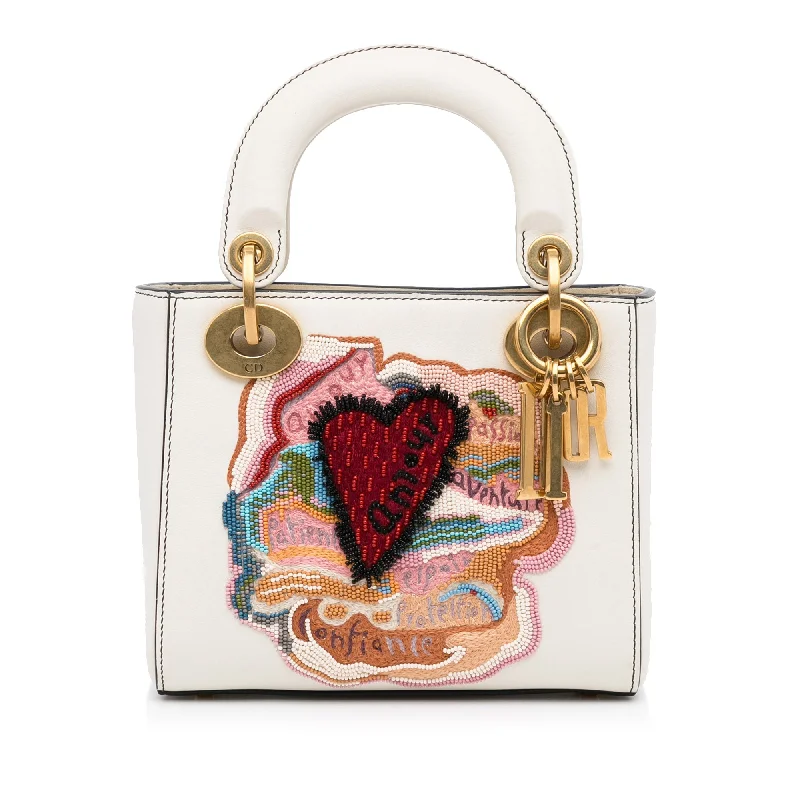 Christian Dior Saddle bags with a studded trim for a bold lookDior x Niki de Saint Phalle DiorAmour Lady Dior Mini White Calfskin Limited Edition