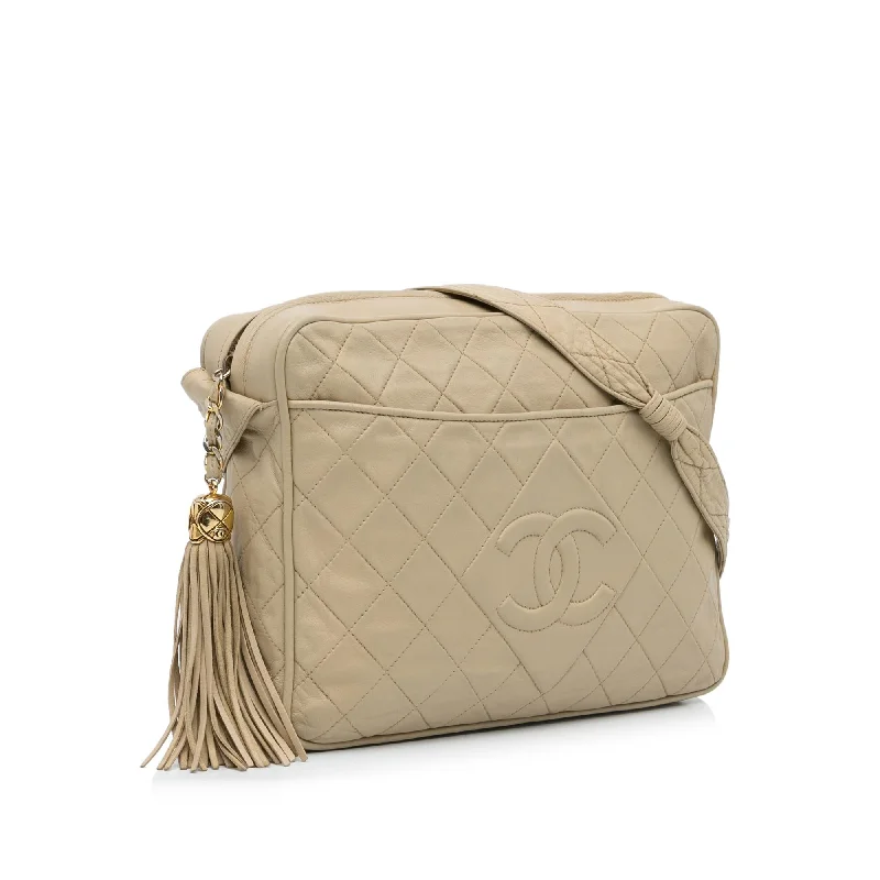 Chanel bags available at online luxury retaileChanel Vintage CC Tassel Camera Bag